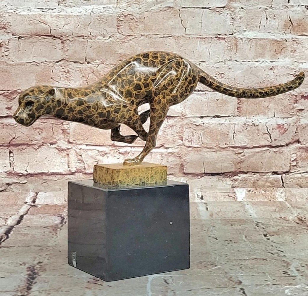 Running Cougar' Bronze Sculpture by Miguel Lopez - 8" x 12": 'Running Cougar' Bronze Sculpture by Miguel Lopez - 8" x 12" This bronze sculpture by Portuguese artist Miguel Lopez, also known as Milo, captures the raw power and agility of a running cougar