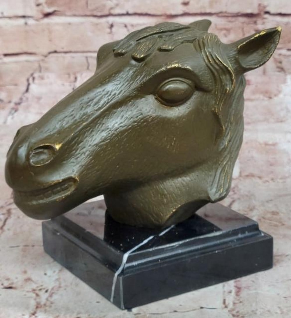 Equine Nobility: Bronze Horse Bust: Equine Nobility: Bronze Horse Bust A powerful tribute to the strength and spirit of the horse, this bronze bust sculpture captures the noble head of a steed with striking realism and grace. From the f