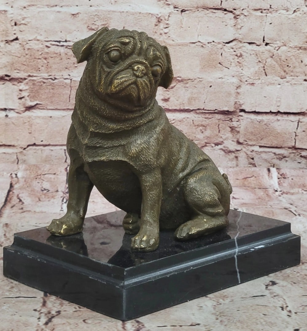 Seated Pug Original Bronze Statue - 8" x 8": Seated Pug Original Bronze Statue - 8" x 8" This expertly crafted bronze sculpture captures the loyal and tenacious spirit of the English Bulldog with remarkable realism and charm. The dog's m