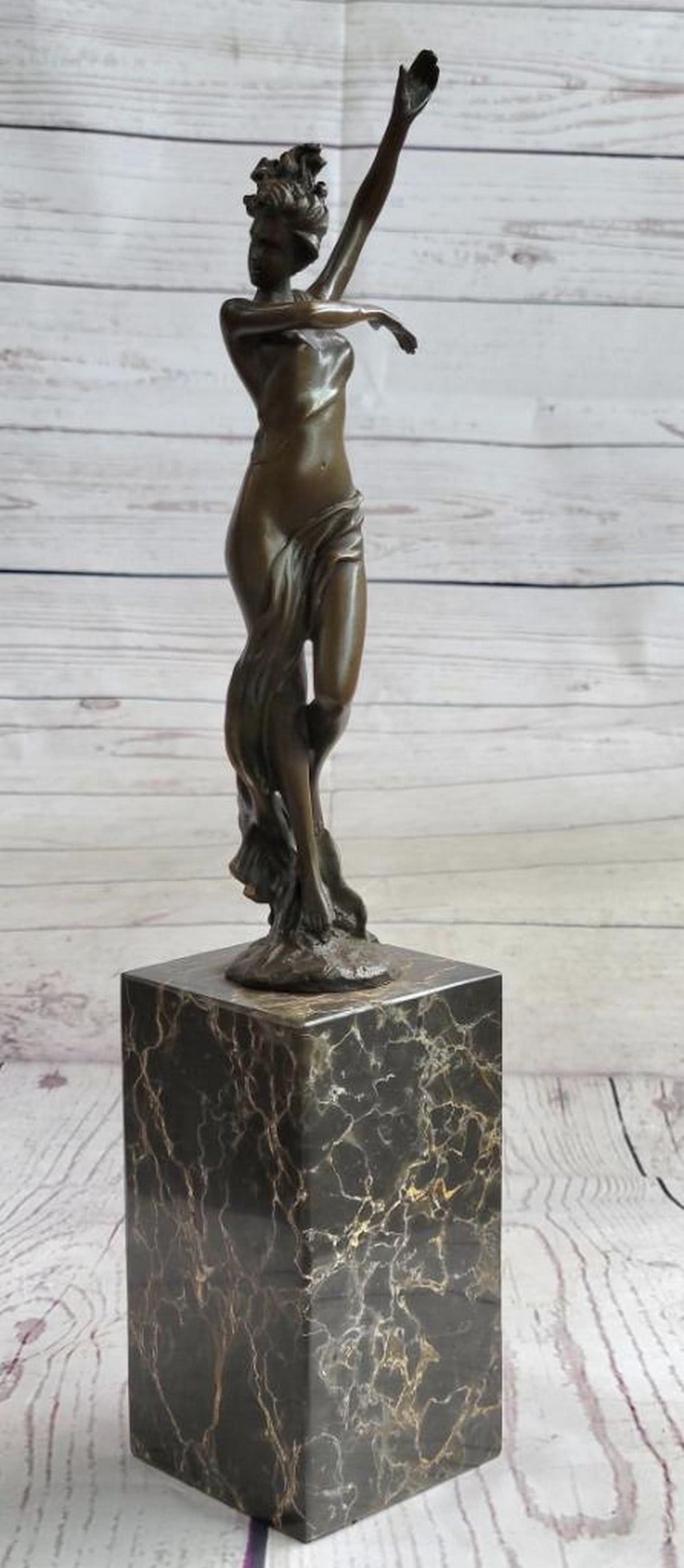 Bronze Confident Woman with Flowing Hair Sculpture by Milo - 14.5" x 3": Bronze Confident Woman with Flowing Hair Sculpture by Milo - 14.5" x 3" This captivating bronze sculpture by Milo exudes confidence and sensuality, celebrating the beauty of diverse forms. The