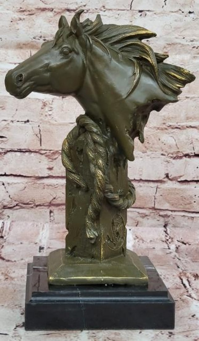 Tethered Grace: Bronze Horse Head Bust: Tethered Grace: Bronze Horse Head Bust This striking bronze sculpture captures the noble essence of the horse in a beautifully detailed head bust. With a rope gently tied to a textured wooden pole, th