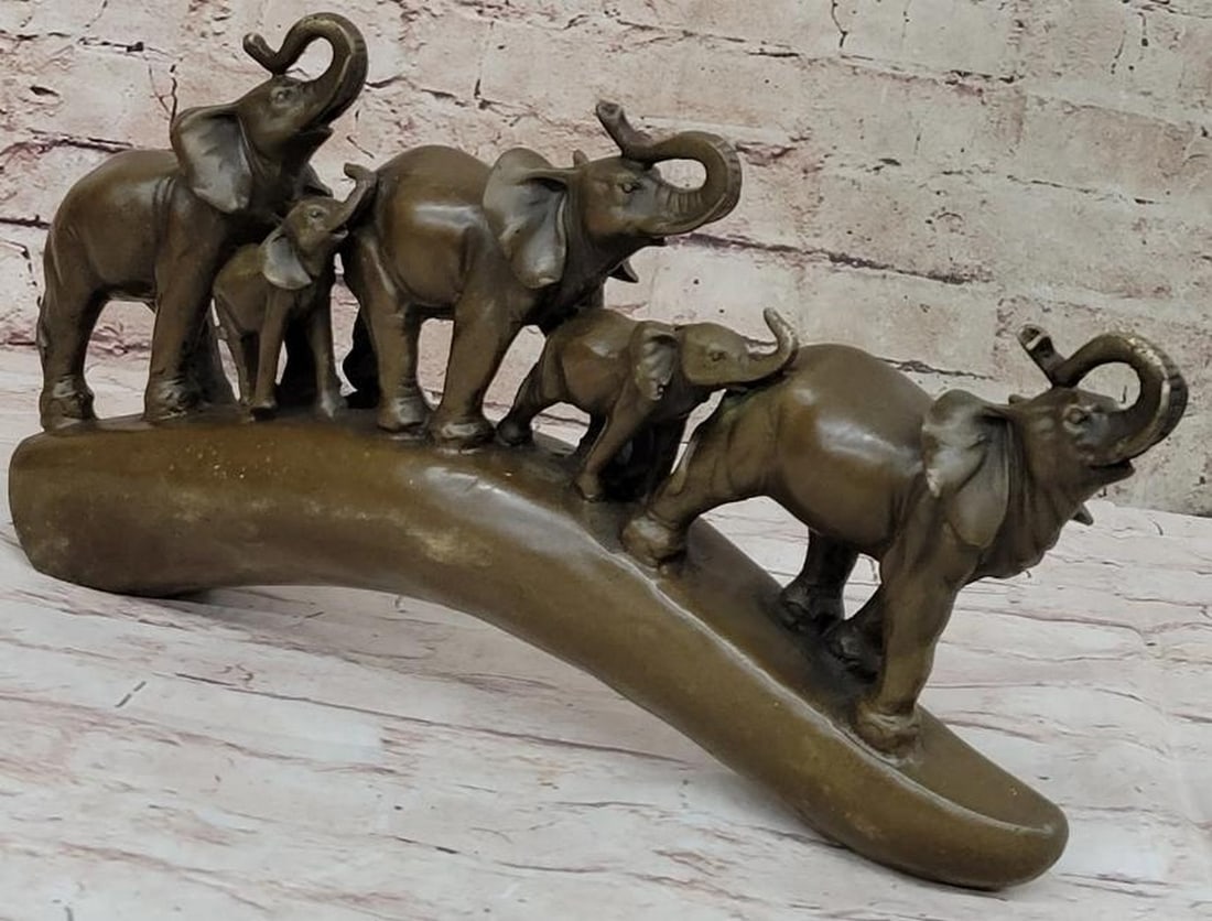 Elephant Family Journey Bronze Sculpture: Elephant Family Journey Bronze Sculpture Symbolizing unity, strength, and protection, this beautifully crafted bronze sculpture features three adult elephants walking in line with two baby elephants n