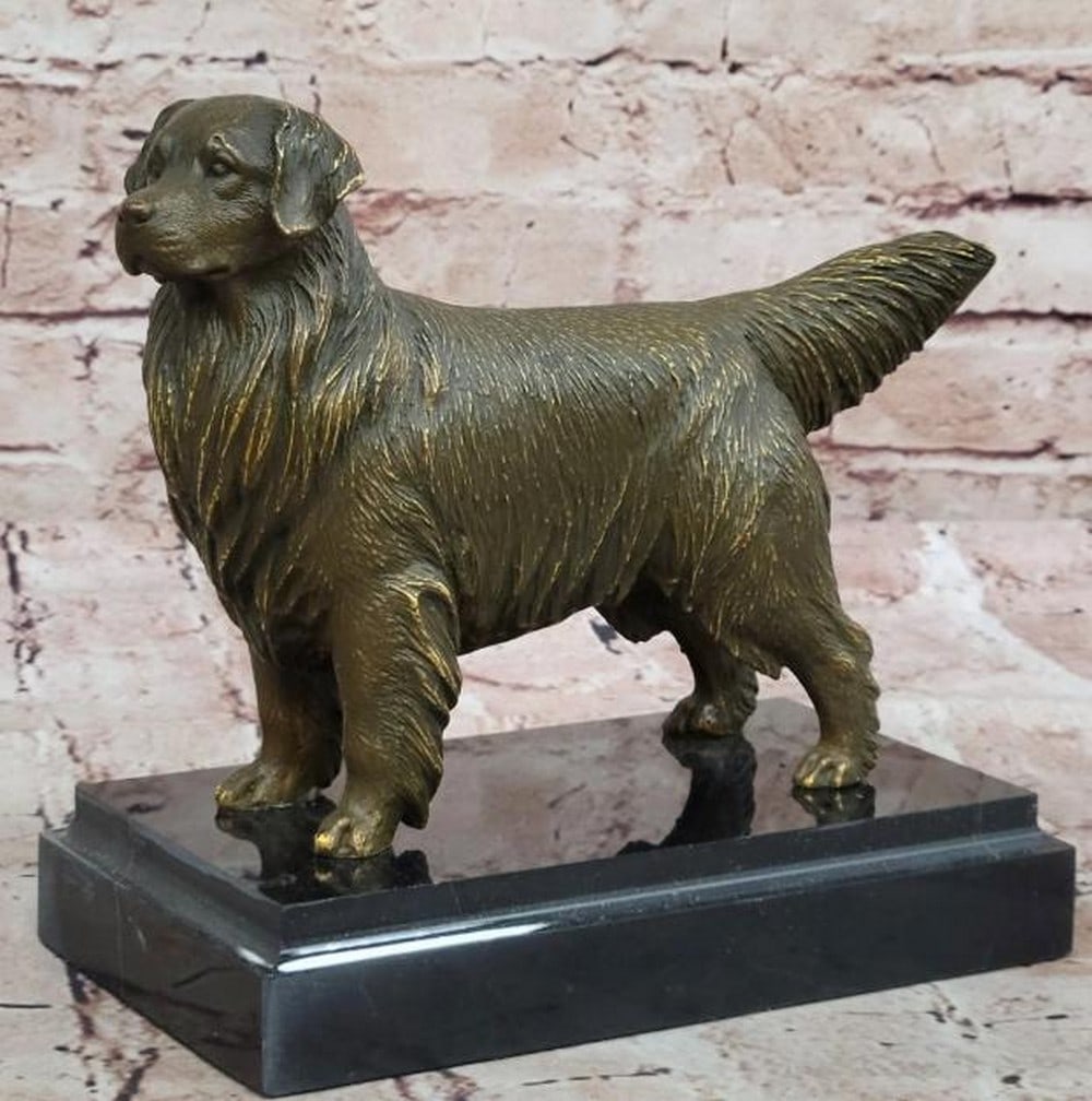 Loyal Grace: Reproduction Bronze Golden Retriever Statue: Loyal Grace: Reproduction Bronze Golden Retriever Statue This exquisite reproduction bronze statue captures the gentle and faithful spirit of the Golden Retriever with remarkable detail and lifelike p
