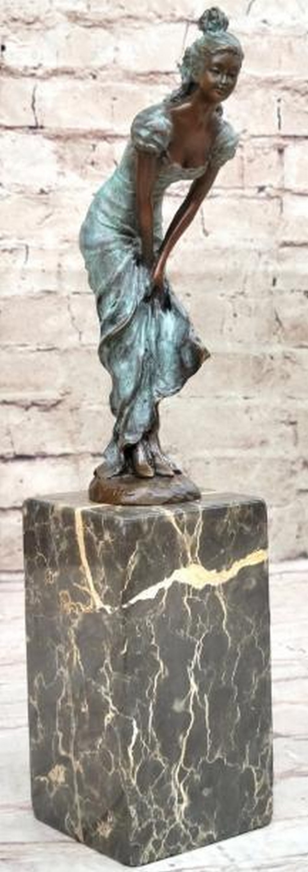 Art Deco Grace Blue Patina Bronze Bookend Sculpture: Art Deco Grace Blue Patina Bronze Bookend Sculpture A stunning blend of elegance and function, this is a bronze bookend sculpture featuring a poised woman in a flowing, body-hugging dress with a delic