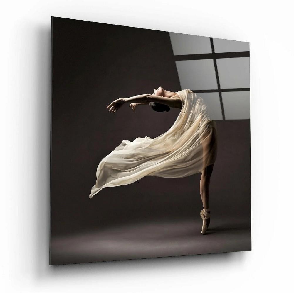 Ballerina in Motion Glass Wall Art: Ballerina in Motion Glass Wall Art A tempered glass wall piece featuring a dancer captured mid-motion, with flowing fabric extending gracefully through the composition. The scene emphasizes movement a