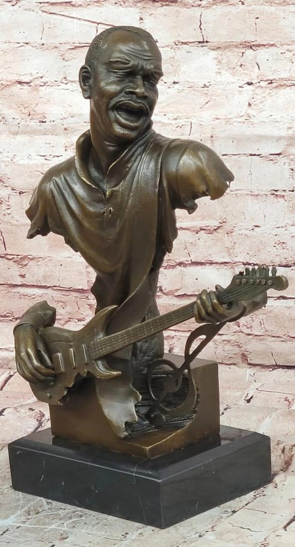 Bronze Guitarist Musician Sculpture on Marble Base - 17" x 12": Bronze Guitarist Musician Sculpture on Marble Base - 17" x 12" Bronze sculpture depicting a musician playing the guitar, mounted on a black variegated marble base. Handcrafted using the tradit