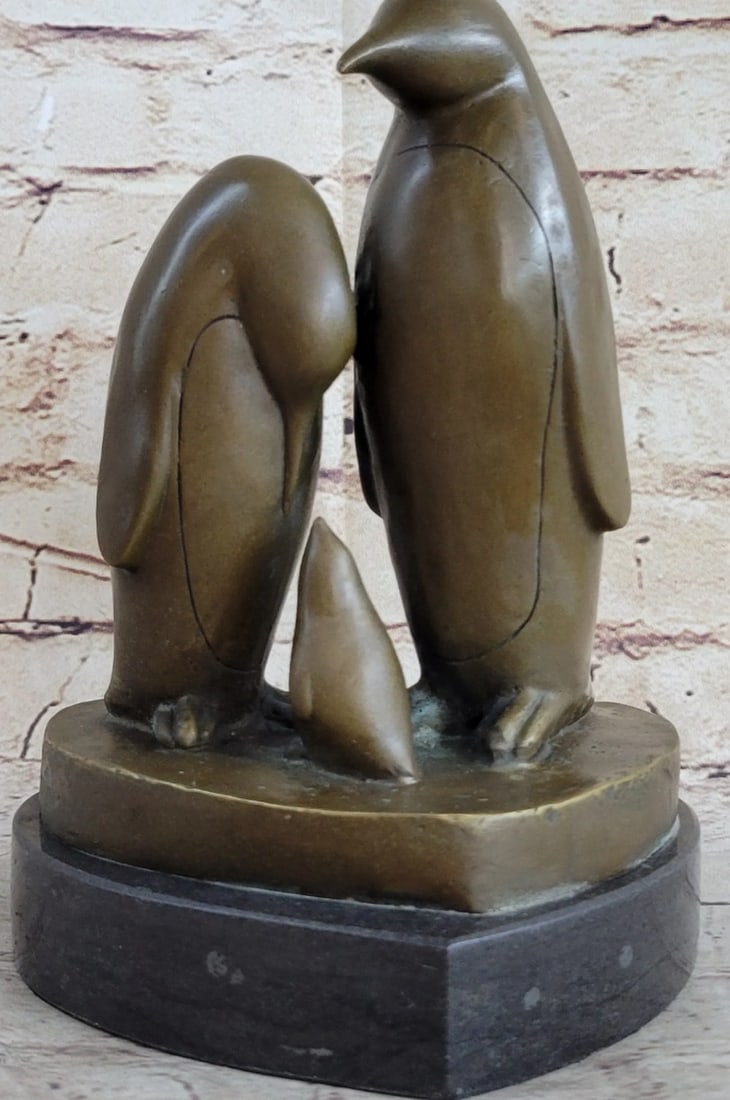 Penguin Family Bronze Sculpture by Milo with Marble Base - 8" x 6": Penguin Family Bronze Sculpture by Milo with Marble Base - 8" x 6" This signed bronze sculpture by Milo depicts a penguin pair caring for their newborn, capturing a quiet and balanced wildlife