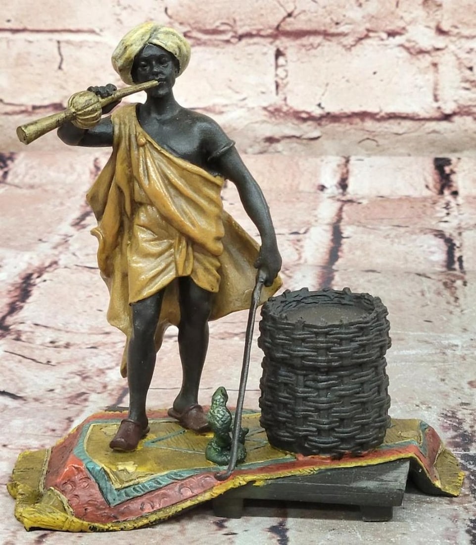 Snake Charmer' Cold-Painted Vienna Bronze Figurine - 5.5" x 5.5": 'Snake Charmer' Cold-Painted Vienna Bronze Figurine - 5.5" x 5.5" This Franz Bergman - inspired bronze sculpture depicts an Orientalist scene titled 'Snake Charmer.' The figure shows a charmer