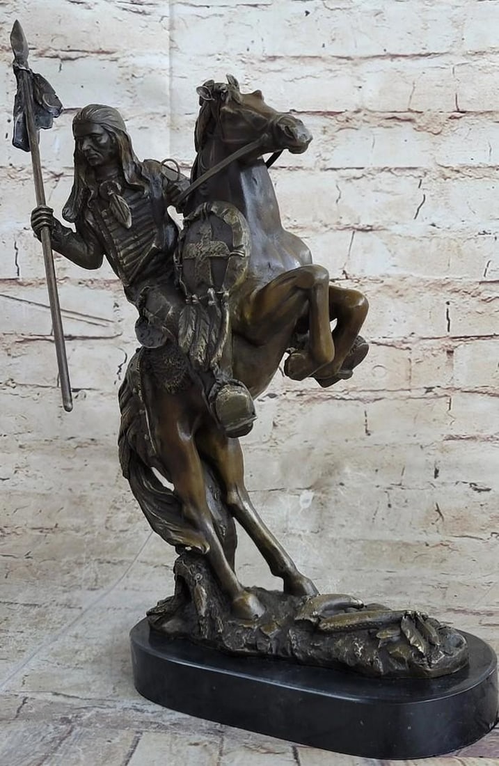 Spirit Rider: Bronze Sculpture of Chief on Horseback: Spirit Rider: Bronze Sculpture of Chief on Horseback. This sculpture captures the strength and grace of an American indigenous chief on horseback. With intricate detailing, it showcases the chief's no