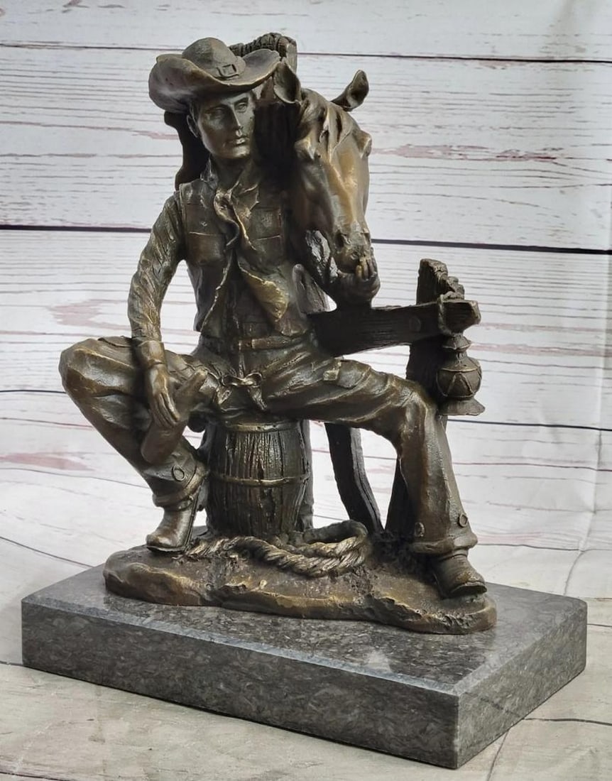 Cowboy & Horse Sitting Having a Drink Bronze Statue Sculpture Country Western: The Trusted Companions in this sculpture, a cowboy and his horse, are eager and ready to ride the trail together. this bronze figures are standing on rocky soil with a lucky Horseshoe . Cowboy has cha