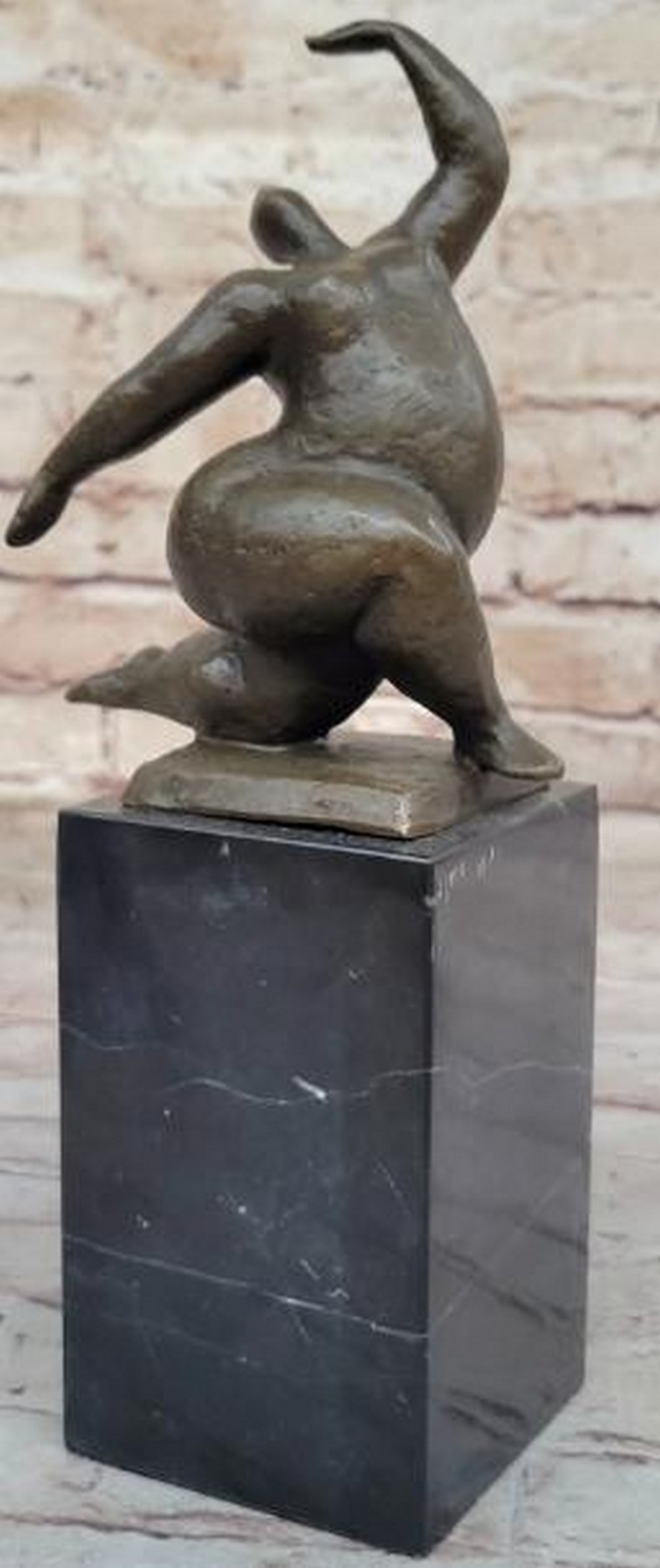 Abstract Dancing Form Bronze Sculpture: Abstract Dancing Form Bronze Sculpture Fluid and expressive, this is a captivating abstract bronze sculpture that captures the essence of dance and movement in minimalist form. The figure evokes grace