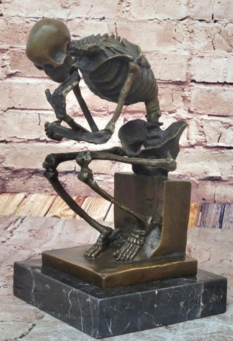 Skeleton Thinker Bronze Sculpture: Skeleton Thinker Bronze Sculpture A haunting twist on a timeless masterpiece, this is a hot cast bronze sculpture depicting a skeleton in the iconic pose of Rodin's The Thinker. With one bony hand res