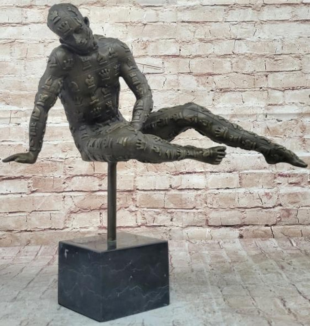 Surreal Chess Man Bronze Sculpture: Surreal Chess Man Bronze Sculpture Strange, symbolic, and unmistakably surreal, this is a reproduction bronze sculpture inspired by the fantastical vision of Salvador Dali, and it bears his signature.