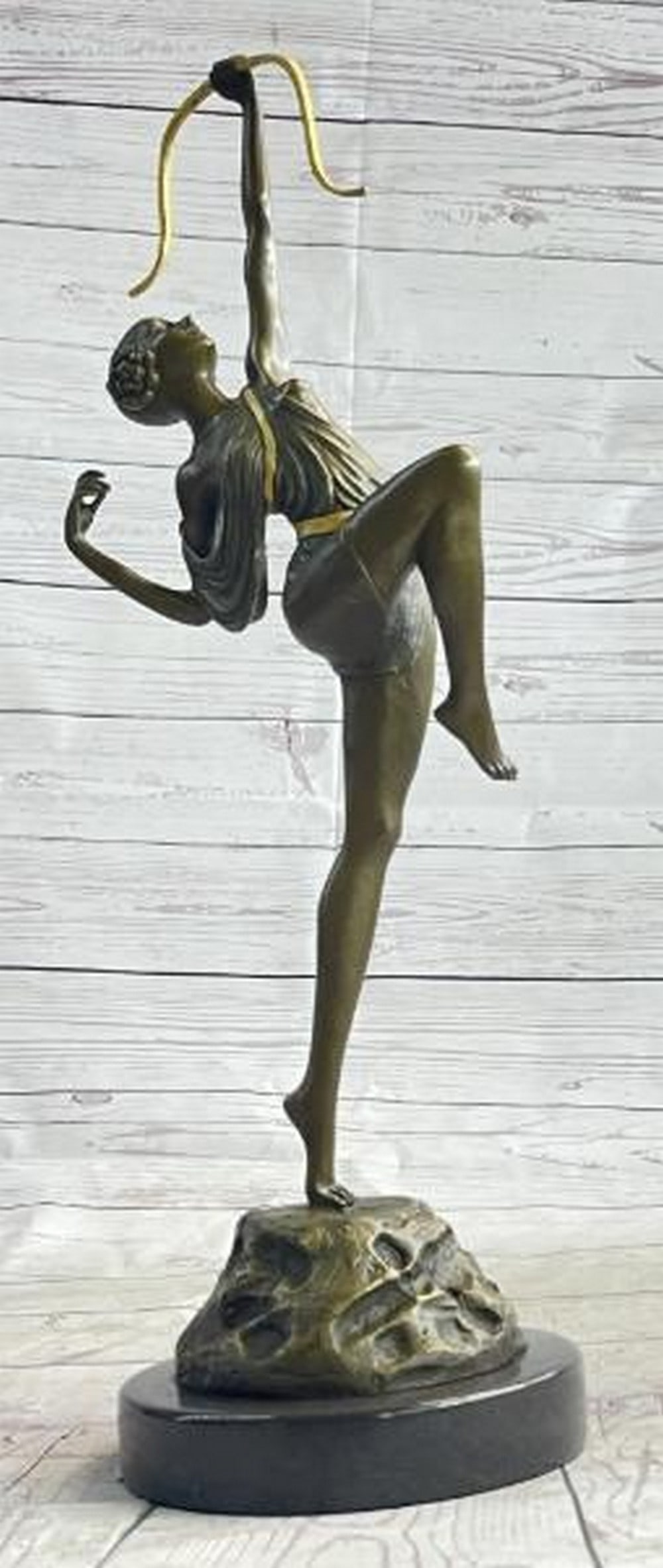 Artemis Ascending: Semi-Nude Diana the Huntress Bronze Sculpture: Artemis Ascending: Semi-Nude Diana the Huntress Bronze Sculpture Power and grace converge in a stunning reproduction bronze statue of Diana the Huntress, goddess of the moon and wild things. Bearing t