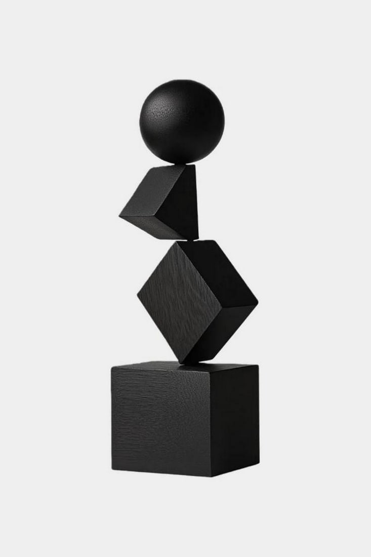Balanced Geometry' Wooden Abstract Sculpture: 'Balanced Geometry' Wooden Abstract Sculpture A hand-carved wooden sculpture composed of stacked geometric forms, featuring a sphere delicately poised above angular shapes in a striking display of bal