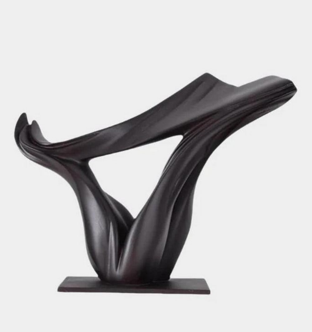 Essence In Grain-Human Form Wood Sculpture: Essence In Grain-Human Form Wood Sculpture Carved from a single piece of richly grained hardwood, this sculpture captures the quiet strength and vulnerability of the human form. Smooth curves and simp