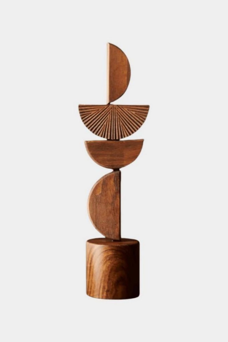 Totem in Stillness Wooden Abstract Sculpture: Totem in Stillness Wooden Abstract Sculpture Crafted entirely by hand, this elegant wooden sculpture layers geometric forms in serene harmony. Its clean lines and warm, natural grain bring a soulful p
