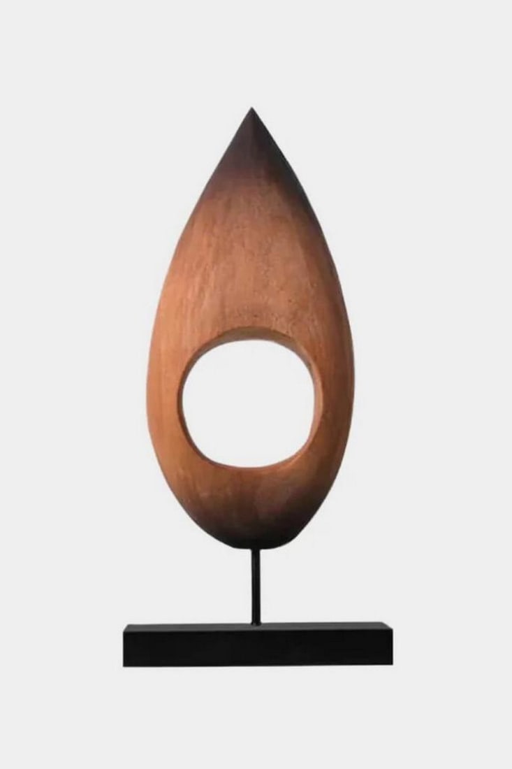 "Whispers of Flame" - Hand-Carved Wooden Sculpture: "Whispers of Flame" - Hand-Carved Wooden Sculpture Elegantly hand-carved from warm-toned wood, this sculpture captures the fluid grace of a rising flame. Its teardrop form and open center play
