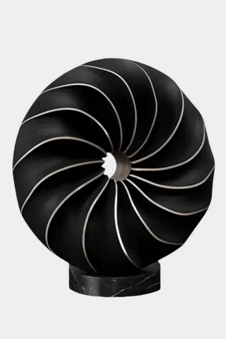 Heartwood Spiral' Wooden Sculpture: 'Heartwood Spiral' Wooden Sculpture Rooted in the timeless language of the forest, this sculpture swirls with the quiet power of nature's design. Its flowing contours mimic the motion of wind through
