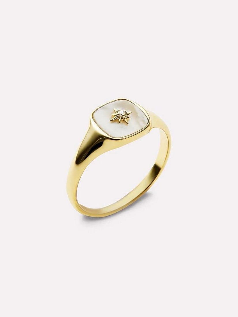 14K Gold-Dipped Mother-of-Pearl Star Signet Ring: 14K Gold-Dipped Mother-of-Pearl Star Signet Ring Go bold with a statement that truly shines. This striking signet ring is dipped in 14K gold and features a luminous Mother-of-Pearl stone highlighted