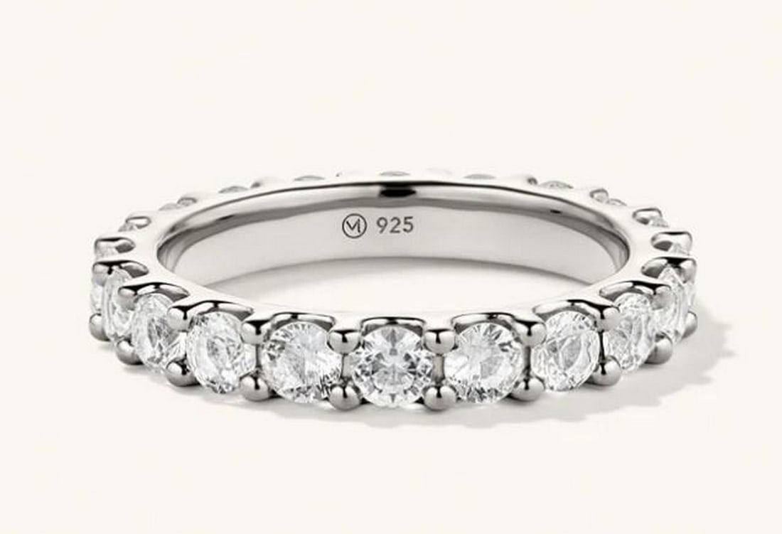 Aurora Sapphire Eternity Band: Aurora Sapphire Eternity Band The Aurora eternity ring features a continuous band of lab-grown sapphires. Each precision-cut stone is ethically crafted to capture the magic of natural light, set in a 