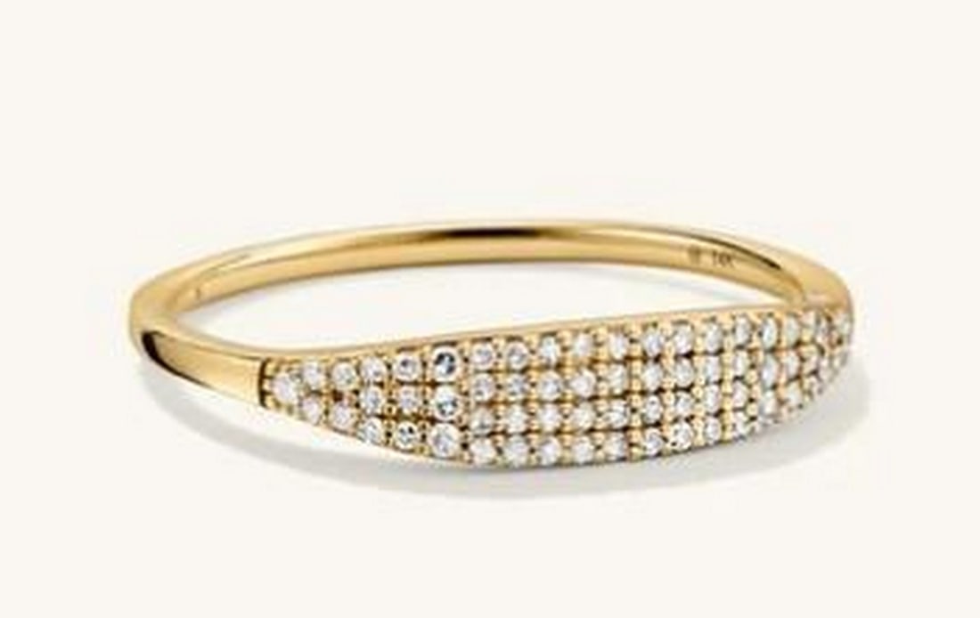 Diamond Pave Slim Signet Ring: Diamond Pave Slim Signet Ring Delicate yet striking, this slim signet ring is adorned with a pave of shimmering diamonds across its minimalist face. The slender silhouette offers a refined take on