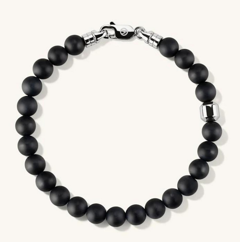 6mm Gemstone Stack Bracelet: 6mm Gemstone Stack Bracelet A timeless strand of 6mm natural gemstone beads, hand-strung for a clean, minimalist look. Whether worn solo or layered, this bracelet adds a subtle touch of earthy