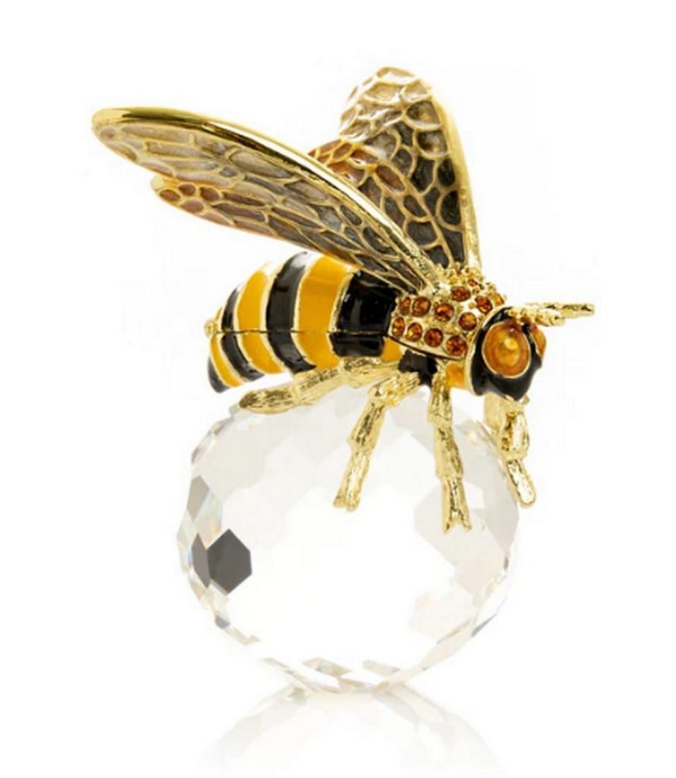 Golden Bee on a Crystal Trinket Box: Golden Bee on a Crystal Trinket Box This hand-painted enamel trinket box, embellished with Austrian crystals, is plated in 24K gold or 925 silver and secured with a magnetic fastener. Each crystal is