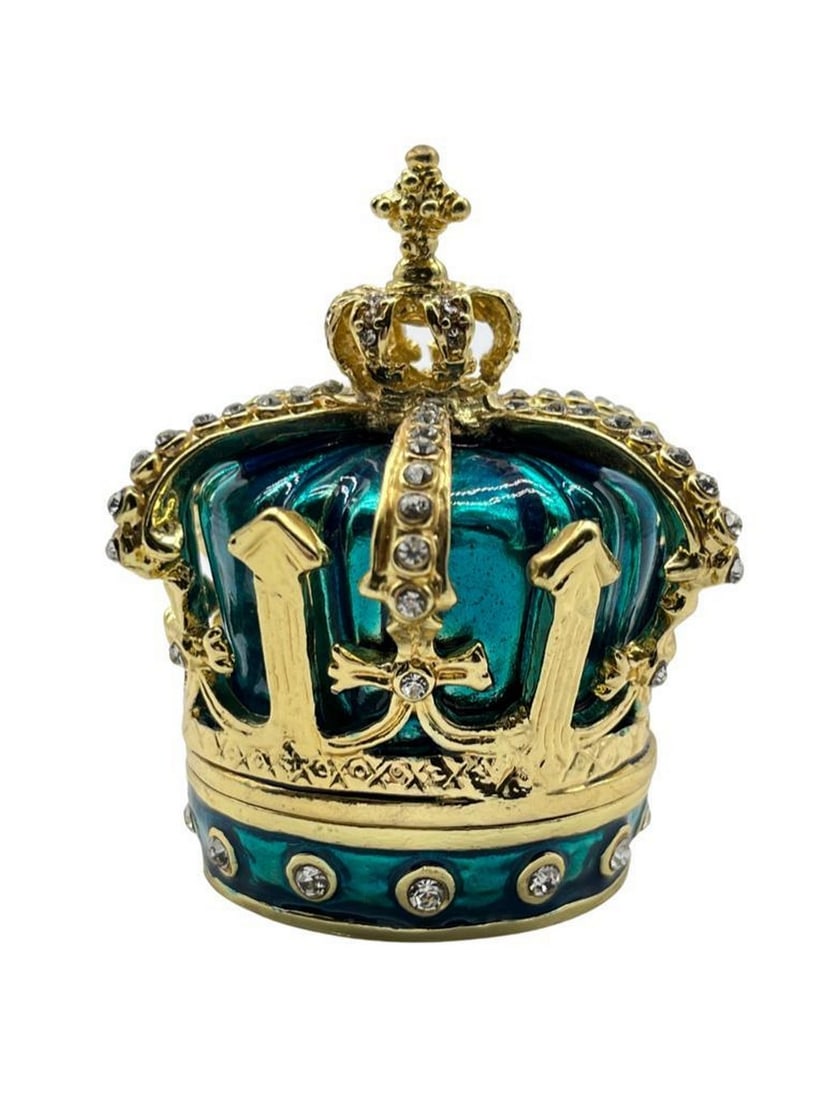 Teal & Gold Crown Trinket Box: Teal & Gold Crown Trinket Box A regal and exquisite piece that exudes opulence and luxury. Crafted from high-quality metal, this trinket box showcases a stunning teal and gold crown design, adorned