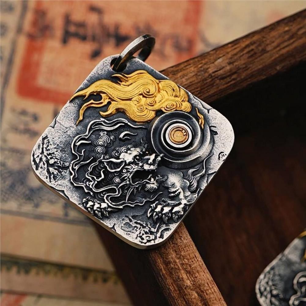 Black God of Fortune Necklace: Black God of Fortune Necklace Handcrafted in Mongolia, the Black God of Fortune Necklace honors a revered deity of wealth and abundance from local folklore. With intricate filigree details and
