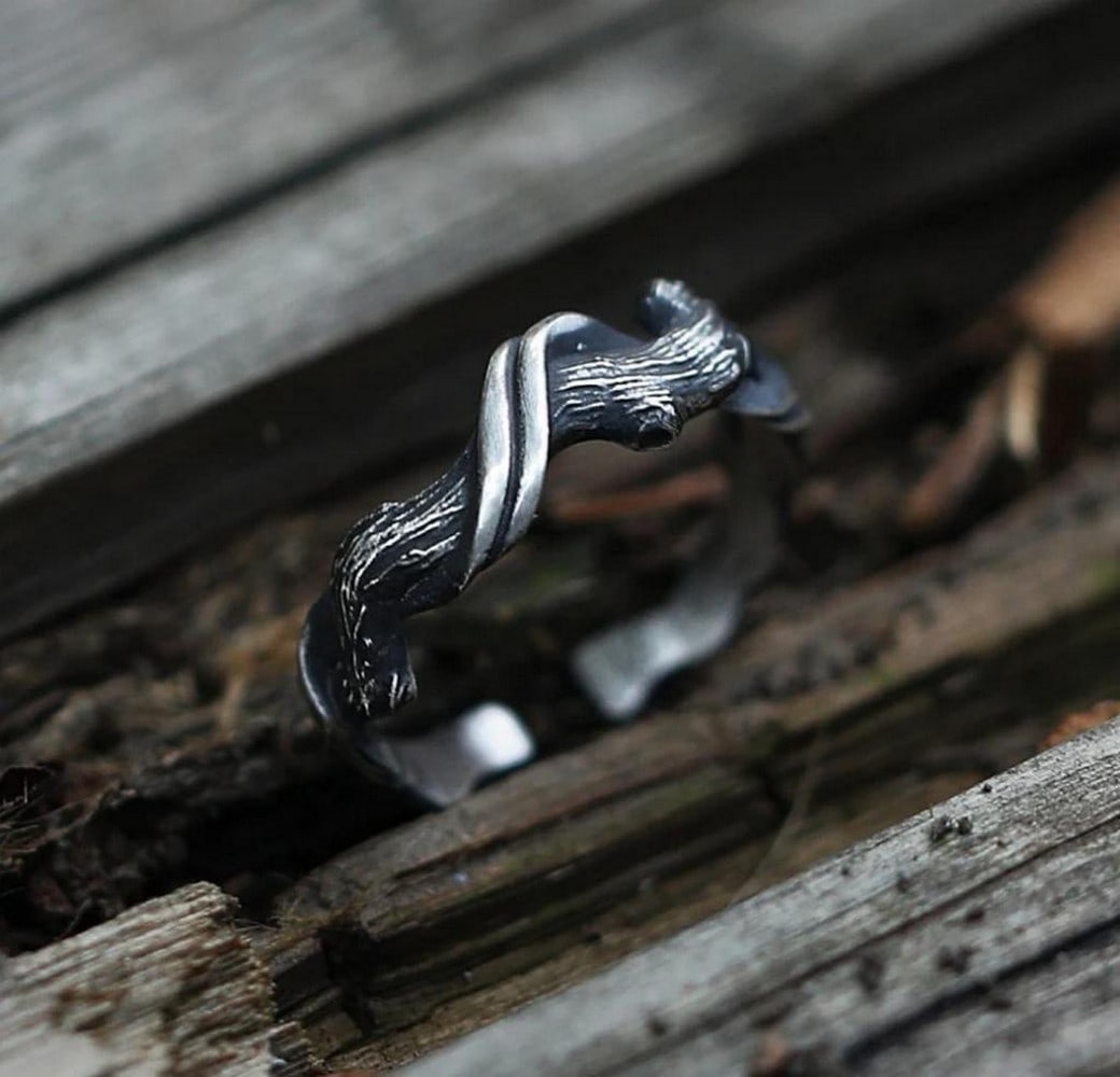 Driftwood Ring: Driftwood Ring Hand-carved by Mongolian artisans, the Driftwood Ring draws inspiration from nature's organic forms and the traditions of nomadic life. Its smooth, weathered textures echo the