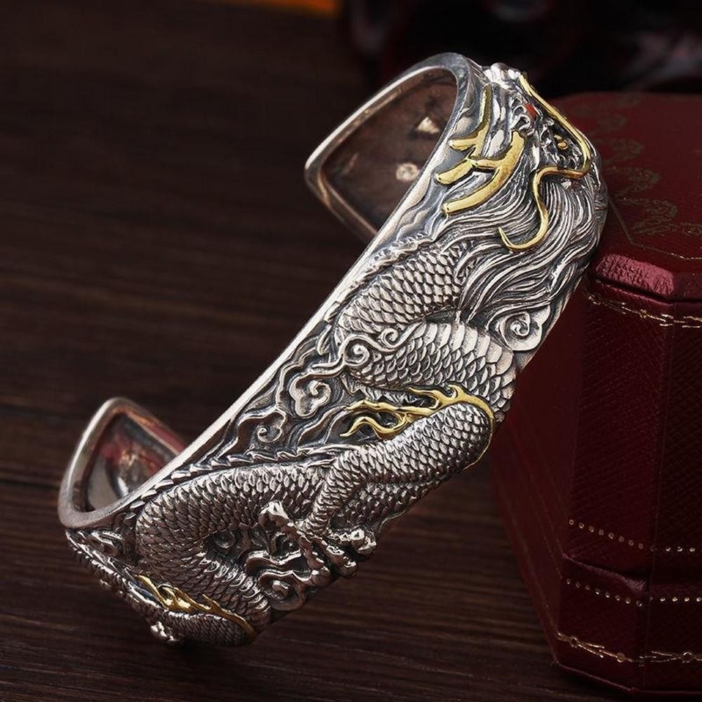 Oriental Dragon Pattern Bangle: Oriental Dragon Pattern Bangle Infused with Eastern legend and Mongolian craftsmanship, the Oriental Dragon Pattern Bangle features a coiled dragon etched in intricate detail - a symbol of strength, w