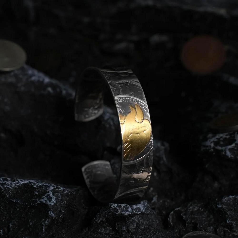 Handmade Walking Liberty Silver Coin Bangle: Handmade Walking Liberty Silver Coin Bangle Crafted from authentic 1945 Walking Liberty silver coins, this double-sided bangle showcases the finest details from each coin's pattern. Hand-cut,