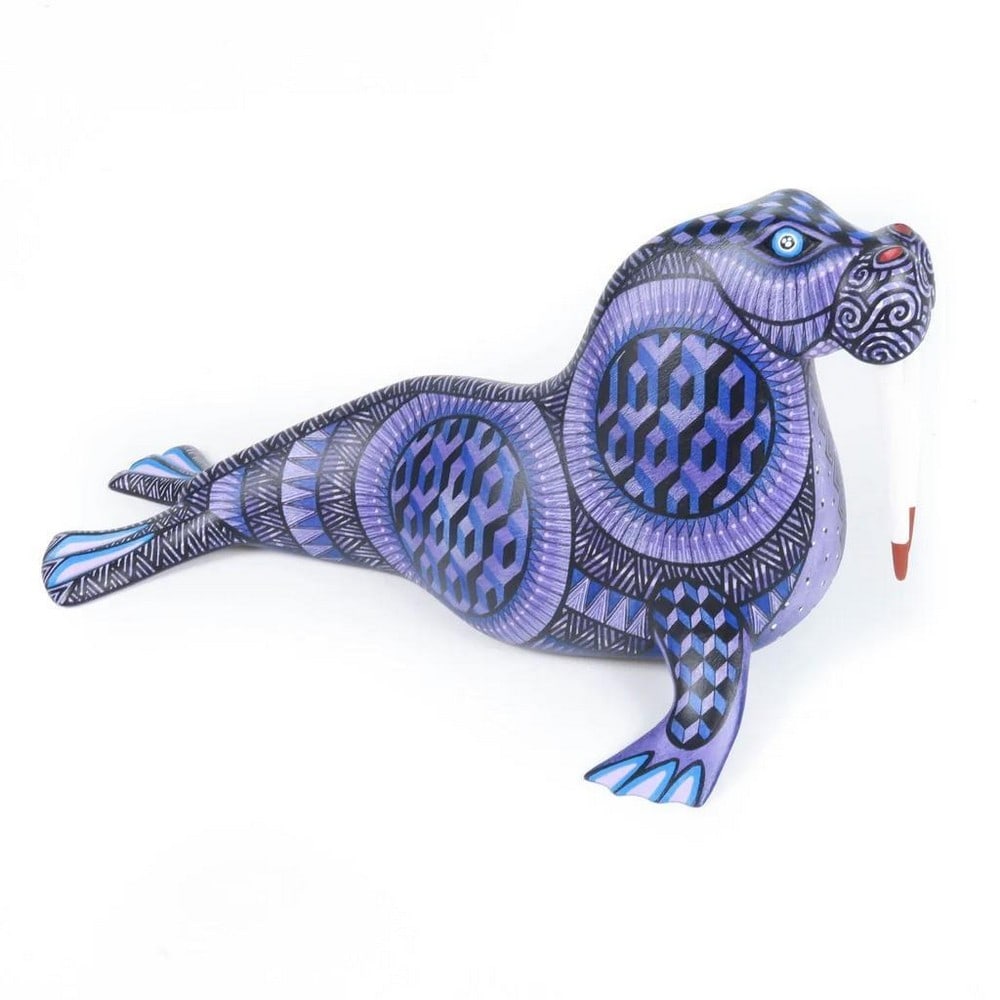 Regal Walrus - Handcrafted Oaxacan Alebrije: Regal Walrus - Handcrafted Oaxacan Alebrije Celebrate the artistry of Oaxaca with this Regal Walrus alebrije, handcrafted by the renowned Morales family in Arrazola. Carved from a single piece of copa
