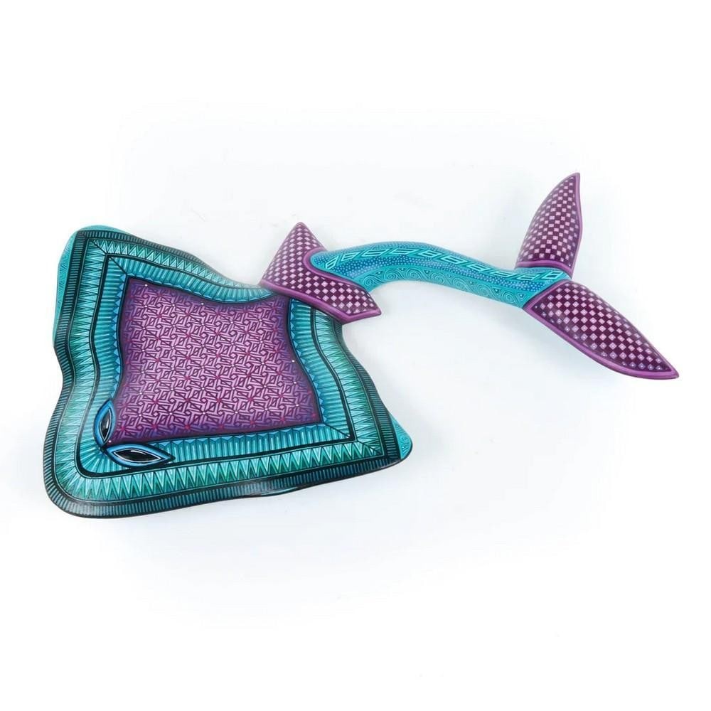 Masterpiece Stingray - Oaxacan Alebrije Wood Carving: Masterpiece Stingray - Oaxacan Alebrije Wood Carving This stunning stingray alebrije is a one-of-a-kind creation by the Morales family, meticulously hand-carved from a single piece of copal wood. Its 