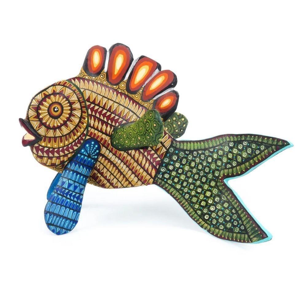 Gorgeous Fish - Hand-Carved Oaxacan Alebrije by the Fuentes Family: Gorgeous Fish - Hand-Carved Oaxacan Alebrije by the Fuentes Family This stunning Gorgeous Fish alebrije is a masterpiece handcrafted by the Fuentes family in their Oaxaca workshop. Carved from sustain