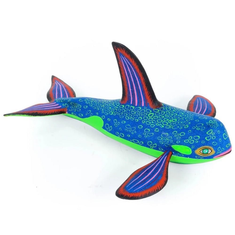 Whale - Oaxacan Alebrije by Eleazar Morales: Whale - Oaxacan Alebrije by Eleazar Morales Dive into the mesmerizing depths of Mexican folk art with this handcrafted whale alebrije, sculpted by world-renowned Oaxacan artist Eleazar Morales. Known 