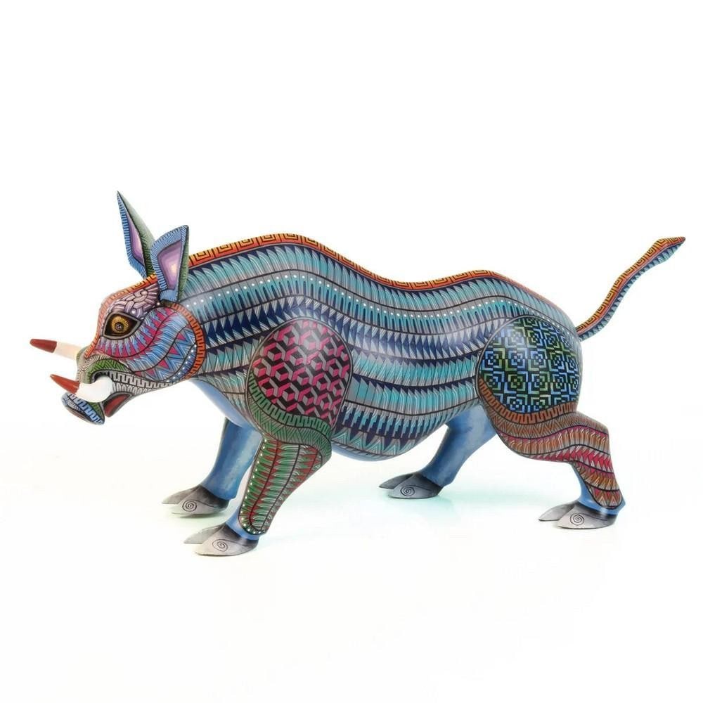 Mystic Wild Boar - Handcrafted Oaxacan Alebrije by the Morales Family: Mystic Wild Boar - Handcrafted Oaxacan Alebrije by the Morales Family Charge into the spirit of tradition with this stunning wild boar alebrije, handcrafted in the heart of Arrazola by the legendary M