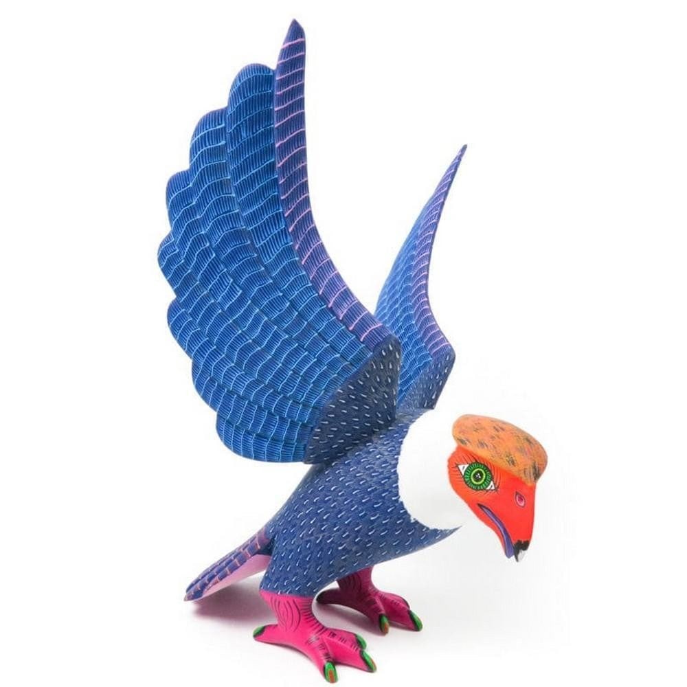Fabulous Eagle - Morales Family Alebrije from Arrazola, Oaxaca: Fabulous Eagle - Morales Family Alebrije from Arrazola, Oaxaca Channeling majesty and motion, this eagle alebrije is a handcrafted marvel from the Morales family workshop in Arrazola, Oaxaca. Known