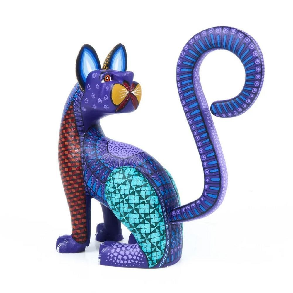 Regal Purple Jaguar - Handcrafted Oaxacan Alebrije by the Fuentes Family: Regal Purple Jaguar - Handcrafted Oaxacan Alebrije by the Fuentes Family This Regal Purple Jaguar alebrije is a vibrant and captivating example of Oaxacan artistry from the Fuentes family workshop.