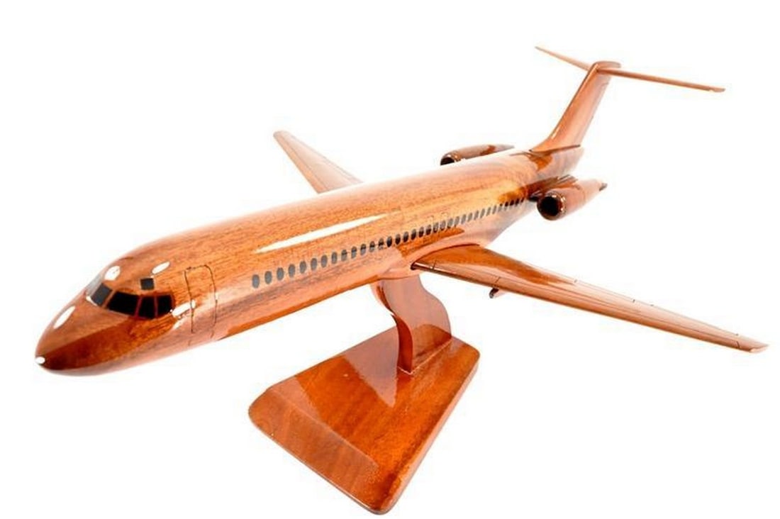 Douglas DC-9 Wooden Model: Douglas DC-9 Wooden Model Step back in time with the McDonnell Douglas DC-9 Model, a finely detailed homage to the classic single-aisle airliner from the esteemed Douglas Aircraft Company.