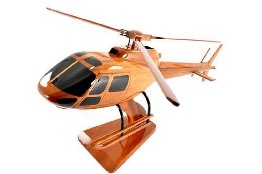 A-Star 350 Helicopter: A-Star 350 Helicopter This handcrafted model of the A-Star 350 Helicopter makes a great addition to a desktop or accent table. With remarkable detail, this scale replica has multiple coats of