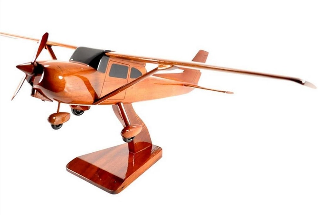 Cessna 172 Scale Model Wooden Replica: Cessna 172 Scale Model Wooden Replica Relive the thrill of flight with our meticulously crafted Mahogany Cessna 172 Scale Model Replica. Long revered as one of the easiest civilian aircraft to fly, th