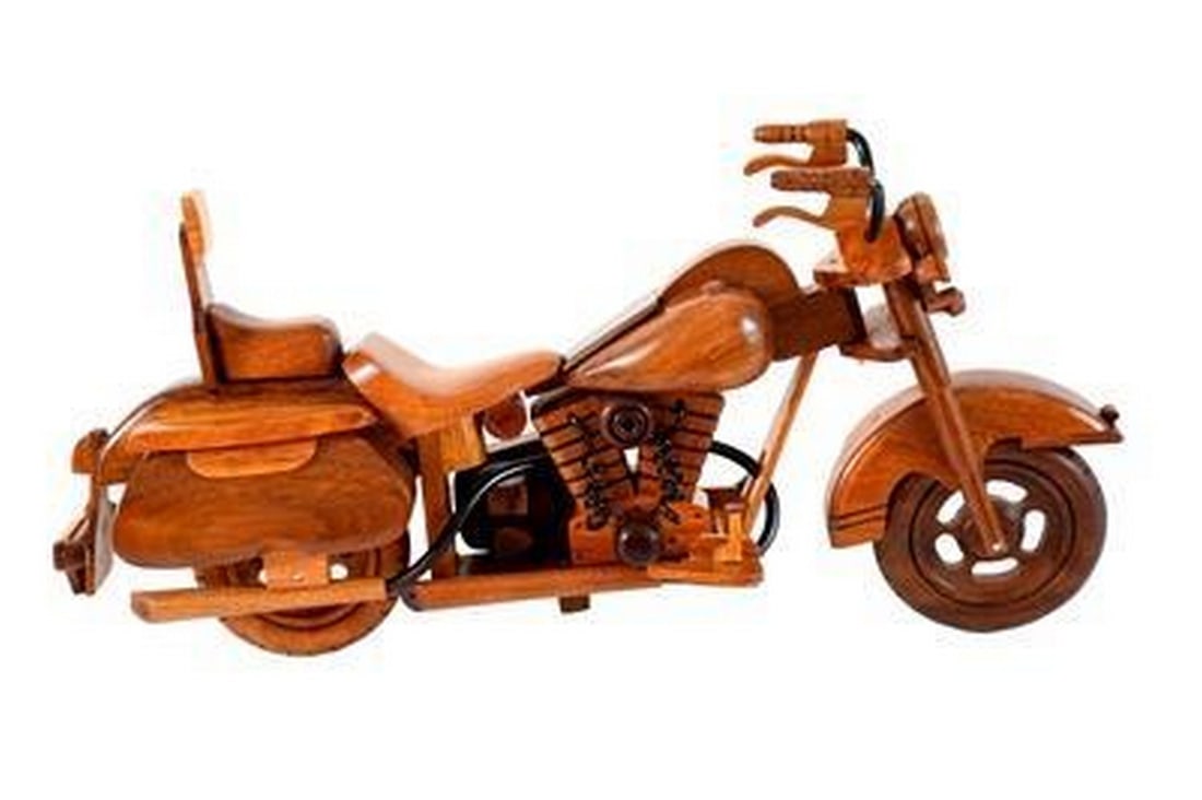 Harley Davidson Heritage High Back: Harley Davidson Heritage High Back This Harley Davidson Heritage High Back motorcycle is handcrafted from solid mahogany. Hand carved details, wheels that roll, working kickstand and movable handlebar