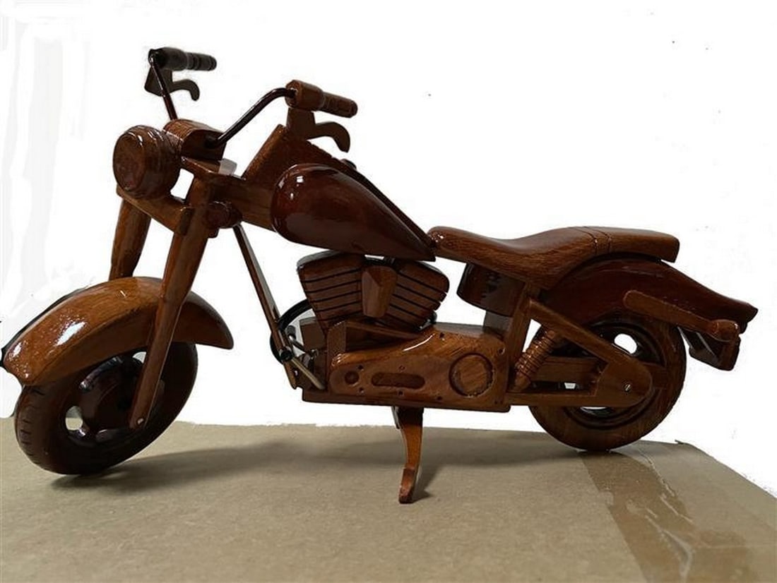 Harley FXSTB' Wooden Bike Model: Harley FXSTB' Wooden Bike Model Introducing the Harley FXSTB Wooden Bike Model, a 13-inch masterpiece meticulously crafted from mahogany wood. This exquisite replica captures the iconic design of the