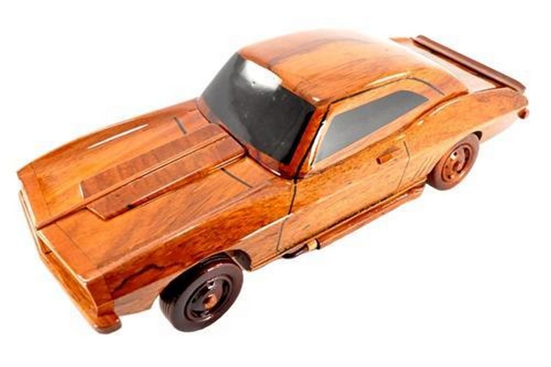 Classic 1969 Chevrolet Camaro: Classic 1969 Chevrolet Camaro Indulge in the timeless allure of the Mahogany Wood Handcrafted Classic 1969 Chevrolet Camaro. Meticulously crafted from rich mahogany wood, this masterpiece captures