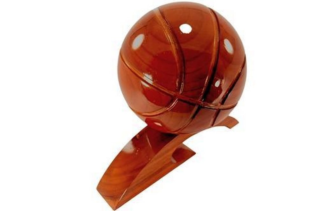 Wooden Basketball: Wooden Basketball Very Unique item and a perfect gift. Perfect for any "Man Cave". The Basketball has a diameter of 7", 10" tall and 12" long base. View photos for further details.