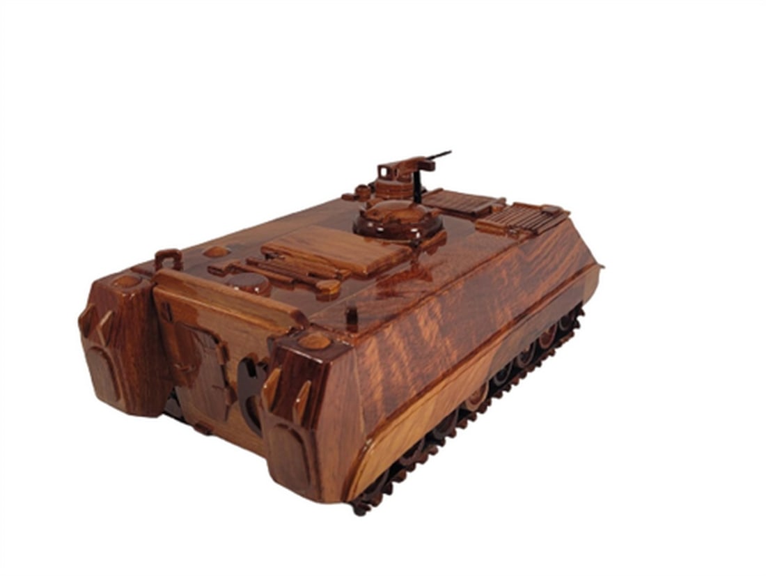 M-113 APC: M-113 APC The M113 APC is beautifully recreated in this handcrafted scale model. Made of solid mahogany and finely detailed, this classic aircraft in a clear polyurethane high gloss finish has deep