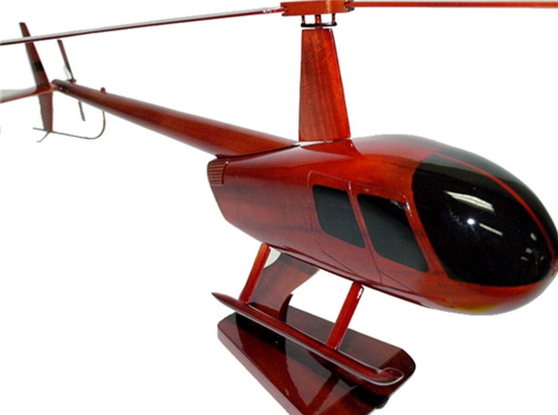 Robinson R-44 Helicopter: Robinson R-44 Helicopter All wood R-44 Robinson Helicopter. The R44 is a single-engined helicopter with a semi-rigid two-bladed main rotor, a two-bladed tail rotor and a skid landing gear. It has an
