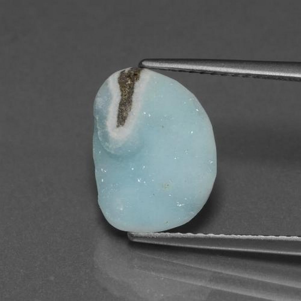 5.83 ct Odd Shape Celeste Blue Hermimorphite Druzy Gemstone: 5.83 ct Odd Shape Celeste Blue Hermimorphite Druzy Gemstone Introducing the mesmerizing Odd Shape Celeste Blue Hermimorphite Druzy Gemstone - a true embodiment of natural artistry. Its unique and